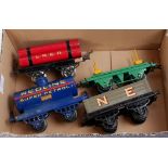 A small tray containing 4 prewar Hornby wagons including 1925-6 LNER Gas Cylinder wagon (G),