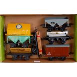 A small tray containing 7 postwar Hornby wagons including Blue Circle Cement, McAlpine side tipper,