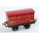 Hornby 1925-28 Crawfords Biscuits van on black open axleguard base with red body and roof,