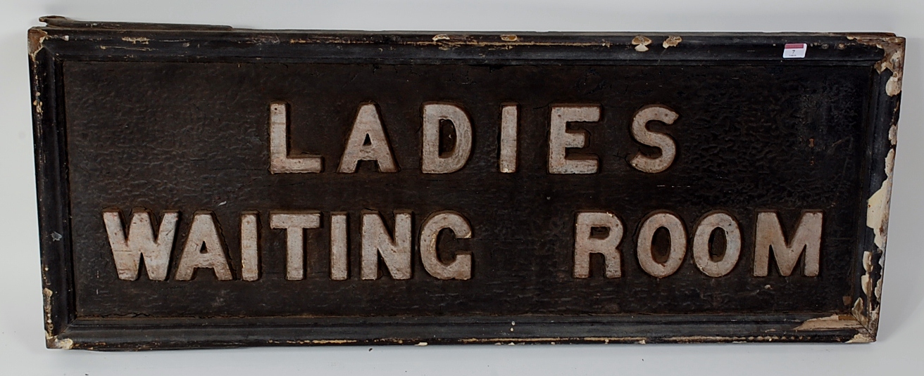 Wooden station sign with metal letters 'Ladies Waiting Room' in original ex-station condition with