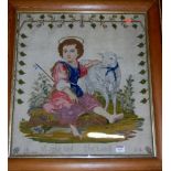 A Victorian woolwork study entitled St John and the Lamb, unsigned but dated 1864,