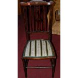 A pair of Edwardian beech slat back bedroom chairs,