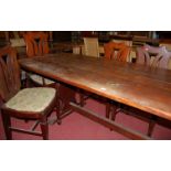 A contemporary hardwood trestle end refectory table,