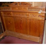 A good late Victorian pitched pine double bedstead,