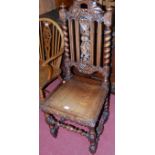 A late 19th century carved oak barley twist panelled seat single dining chair