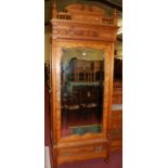 A good late Victorian pitched pine single mirror door wardrobe,