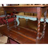 An antique joined oak barley twist long side table,