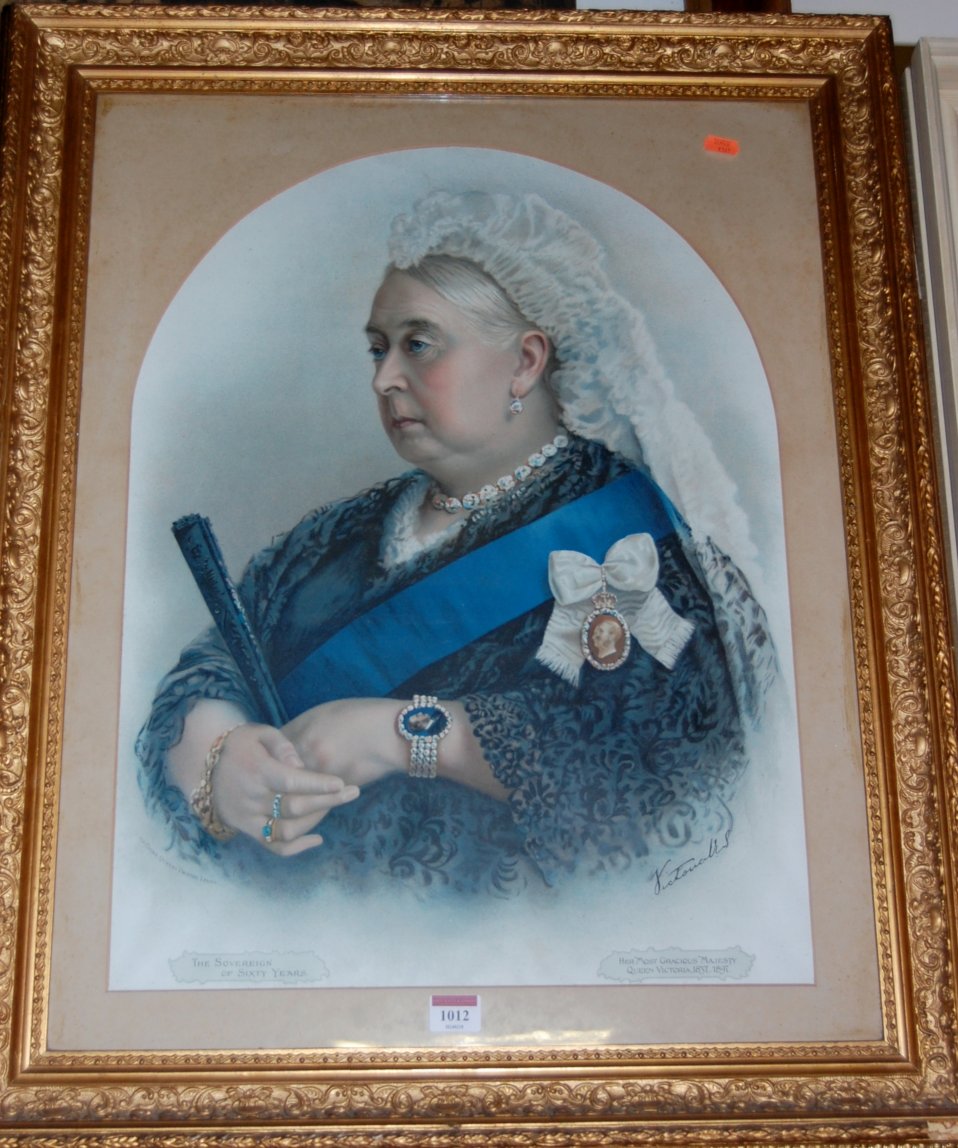 A gilt framed commemorative print of Queen Victoria dated 1897