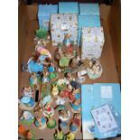 A collection of various resin figures,