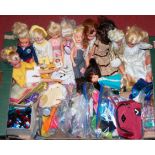 A box of assorted Sindy dolls and dolls clothes etc.