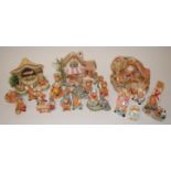 A large collection of assorted Pendelfin rabbit figures and ornaments to include Barrow Boy,