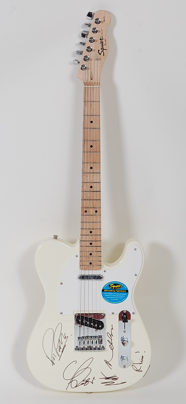 A fender telecaster guitar in cream and white, serial number CY090303903, signed Francis Rossi,