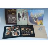 A quantity of various 1960s and later LP and 45 vinyl records, to include; The Beatles,