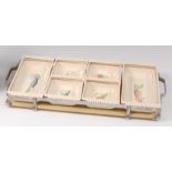 A Susie Cooper glazed pottery six-pieces hors d'oeuvre's set on stand,