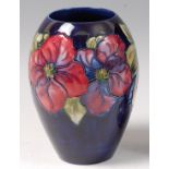 An early 20th century Moorcroft Anemone pattern ovoid vase,
