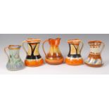 A pair of Myott & Son painted ceramic single handled jugs,