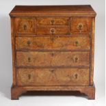 A George III oak and walnut chest,