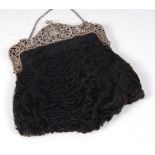 A Continental ladies 800 silver and fur lined evening bag, circa 1900,