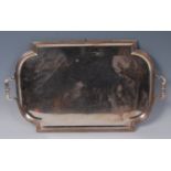 A large George V silver twin handled drinks tray, of shaped rectangular form within raised border,