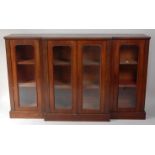 A Victorian mahogany breakfront bookcase by H Mawer & Stephenson Ltd of London,