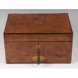 A Victorian figured walnut hinge-topped vanity box, having an ebony and brass strung edge,