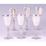 A set of six modern silver pedestal wine goblets, each having knopped slender baluster stems, 30.