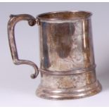 A George V silver tankard, of ribbed cylindrical form, 13.