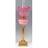 A Victorian brass pedestal oil lamp,