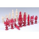 A 19th century Chinese Canton carved ivory puzzle ball chess set,