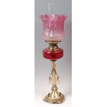 A Victorian brass pedestal oil lamp,