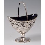 A George III silver sweetmeat basket, of pierced oval form, with bright cut decoration,