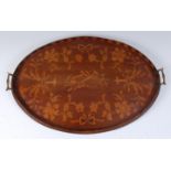 A 19th century mahogany and floral satinwood inlaid galleried oval tray, having twin brass handles,