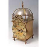 A Victorian brass lantern clock, having bell-top, pierced frieze,