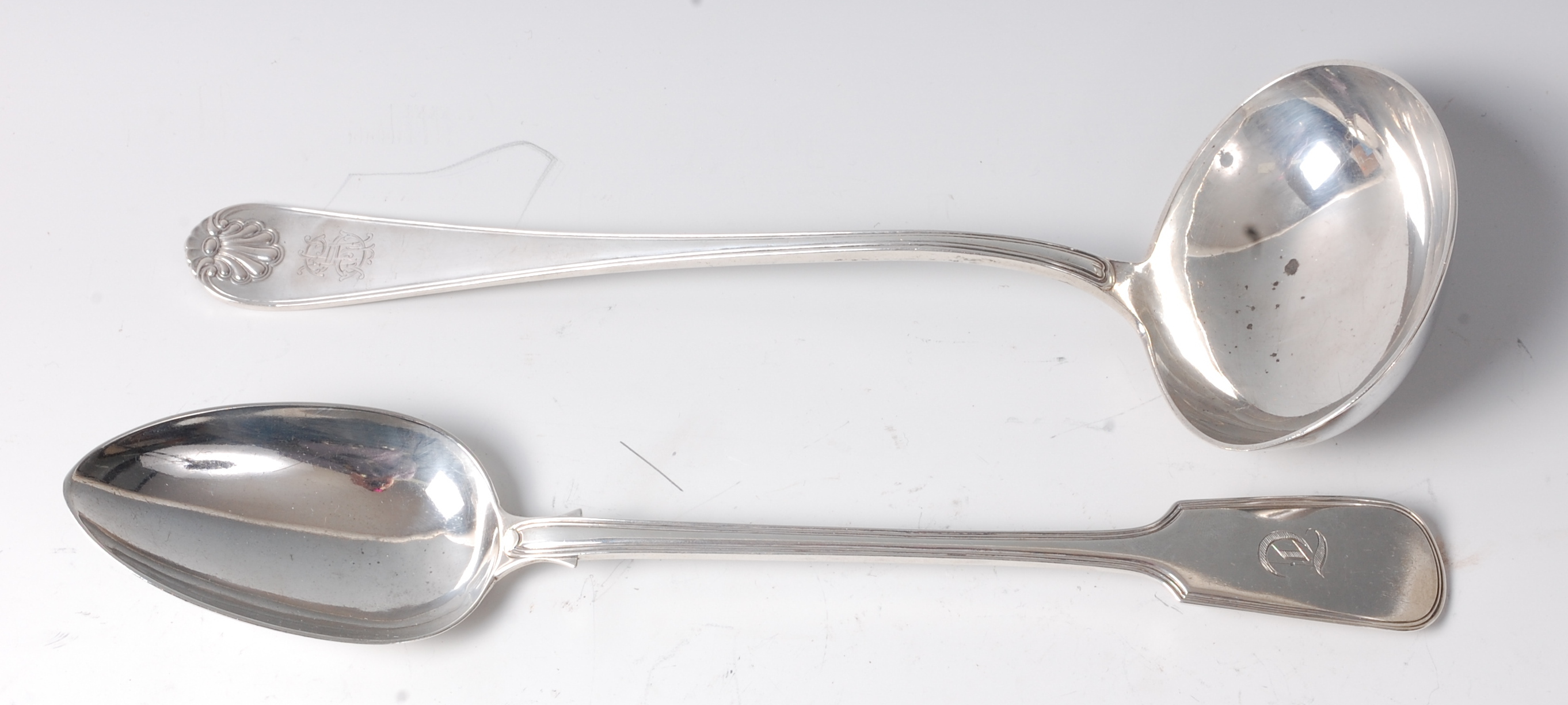 A Victorian silver stuffing spoon, in the Fiddle pattern, engraved with the initial T,
