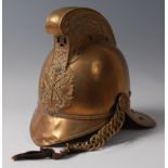 An early 20th century brass Merryweather fireman's helmet,