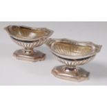 A pair of Irish Regency period silver pedestal table salts,