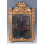 A Louis XVI provincial giltwood wall mirror,