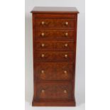A burr walnut crossbanded and feather strung chest, of narrow proportions,