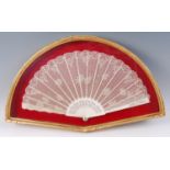 A J Duvelleroy of London & Paris bone and lace fan, having carved and pierced sticks,