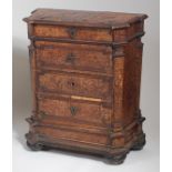 An 18th century continental burr walnut chest, of four long drawers flanked by canted angles,