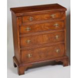 A walnut bachelors chest, in the early 18th century style,
