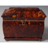 A Regency blond tortoiseshell, white metal and ivory mounted tea caddy, of sarcophagus form,
