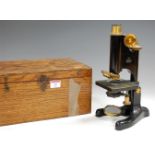 A Beck of London lacquered brass and iron monocular microscope, model 22,