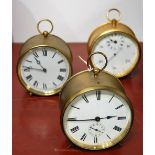 An early 20th century lacquered brass cased drum shaped mantel clock,