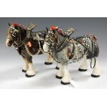 A pair of Melba shire horses in full harness and tack,