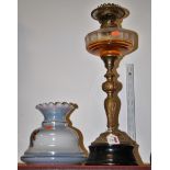 A circa 1900 brass pedestal oil lamp having opalescent frilled glass shade and clear glass