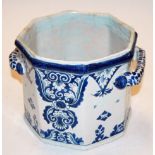 An 18th century French Rouen pottery twin handled planter of hexagonal form