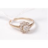 A 9ct CZ cluster ring, the plain band with Common Control Mark, 375, London, size N, (1.