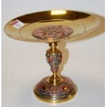 An early 20th century brass and copper tazza,