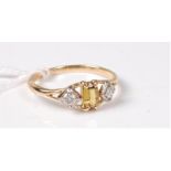 An 18ct yellow hardstone and diamond ring,